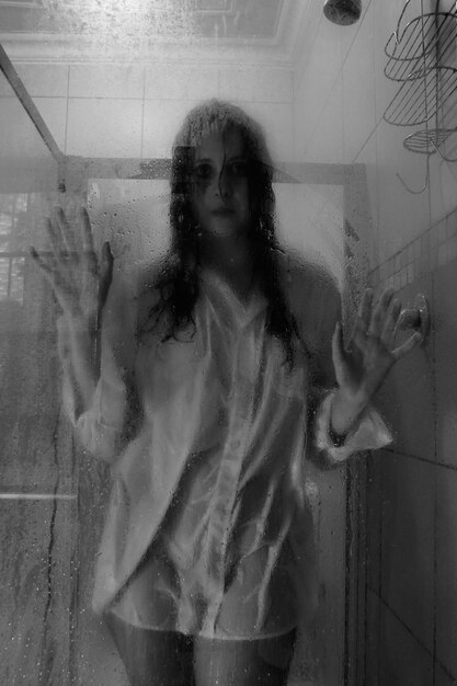 Woman standing in shower