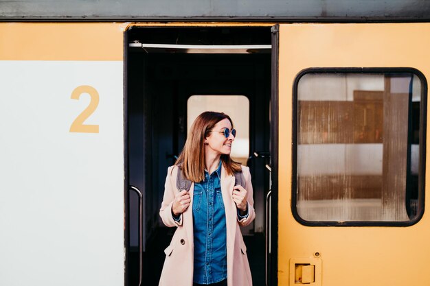 Woman standing in train