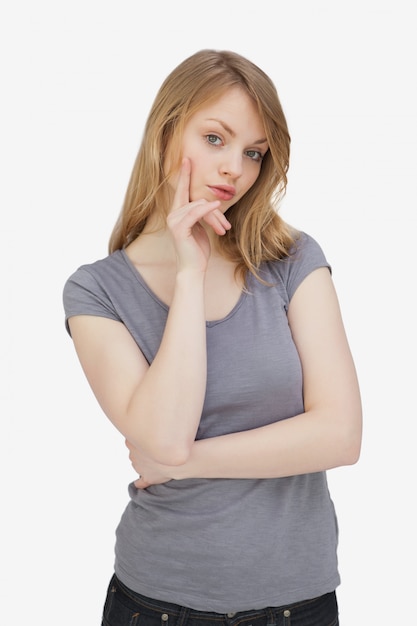 Woman standing while looking at camera