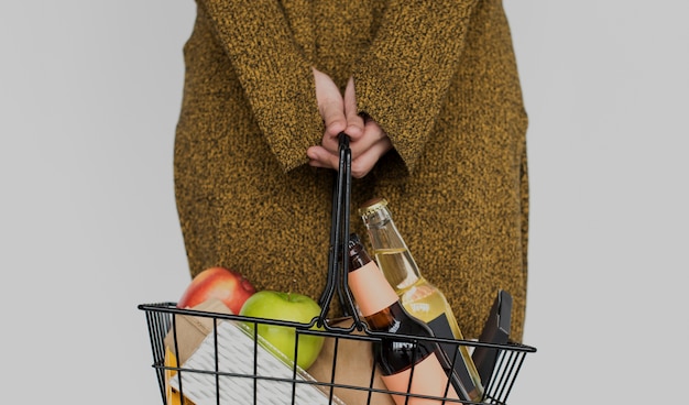 Photo woman standing with basket concept