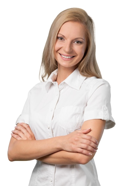 Woman standing with her arms folded