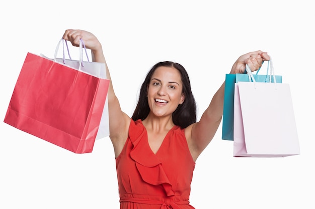 Woman standing with shopping bag