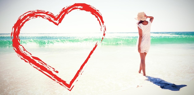 woman in straw hat at beach