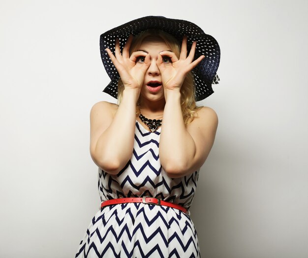 Woman in  straw summer hat