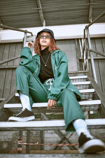 Premium Photo | Woman street fashion and model in city for trendy gen z  portrait freedom urban lifestyle and young black girl with stylish hip hop  clothes sunglasses and hat on building