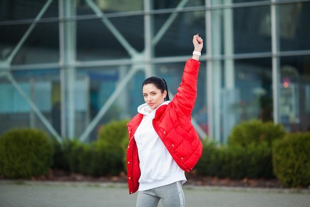 Woman Stretching Body Doing Exercises On Street