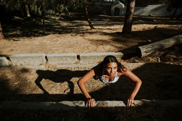 Woman stretching wile on a hike