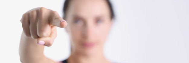 Woman strictly and confidently point finger forward achievement of set goals concept