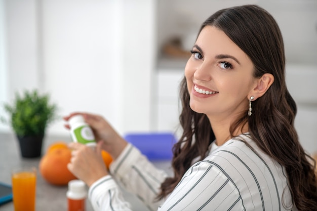 Woman in a striped blouse looking happy