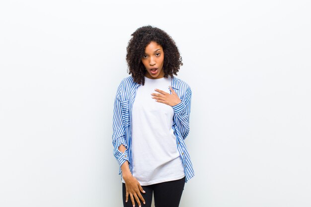 woman in striped shirt and expressive surprised face