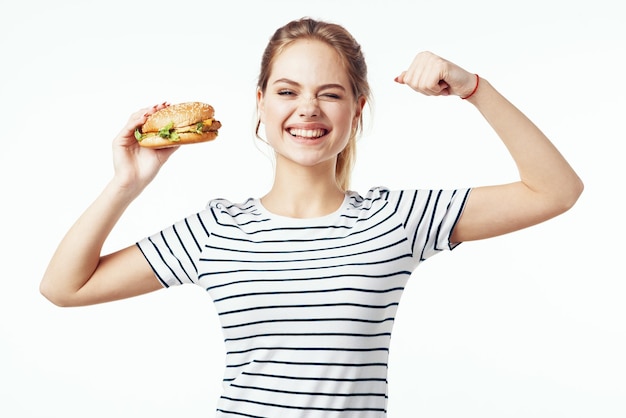 Woman in striped tshirt fast food snack junk food