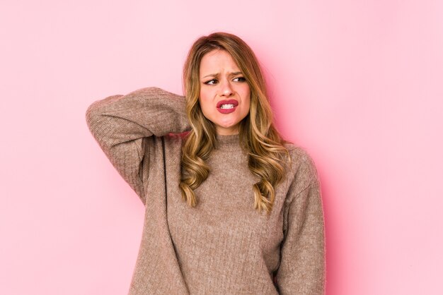 Woman suffering from neck pain