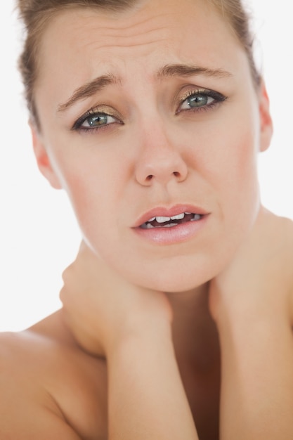 woman suffering from neckache