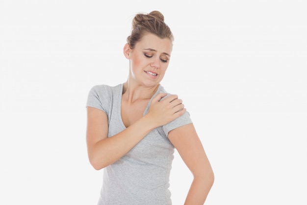 Woman suffering from shoulder pain