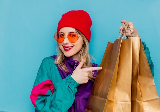 woman in suit of 90s with shopping bags