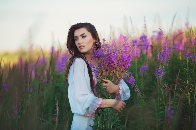 Woman at sunset in lavender field