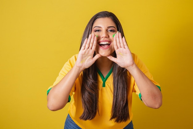 Woman supporter of Brazil 2022 world cup football championship Grigan promotion advertising advertisement screaming goal