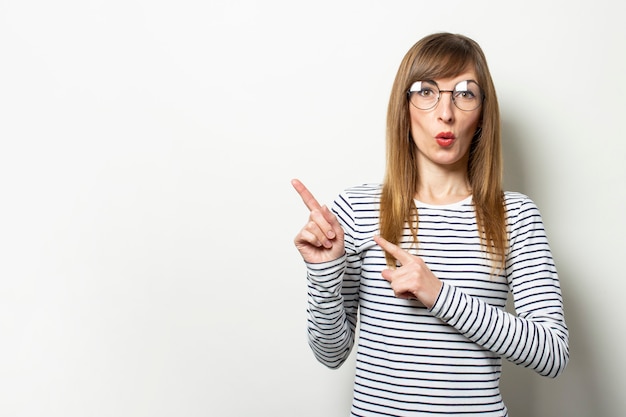 Woman in a sweater with long sleeves and glasses