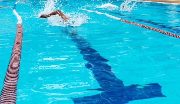 Woman swimming in pool