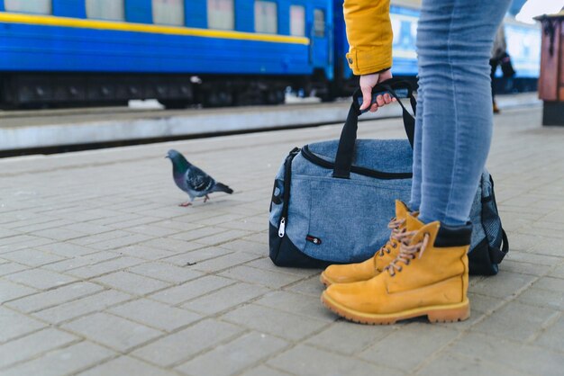 Woman take bag at railway station