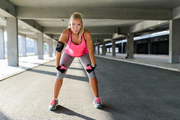 The woman takes a break after a workout