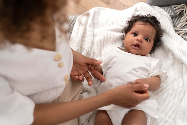 Woman taking care of her baby girl