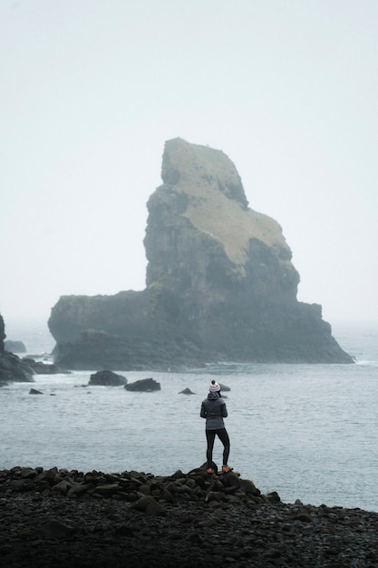 Woman at Talisker Bay on the Isle of Skye in Scotland