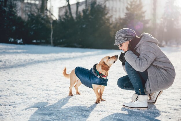 Woman talking to dog