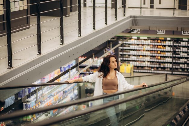 Woman talking on the phone at the building material market High quality photo