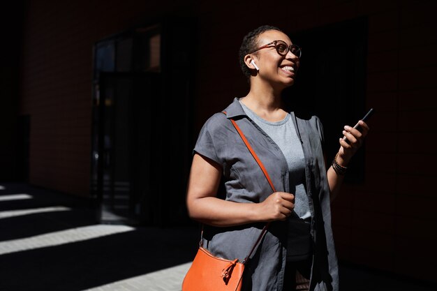 Woman talking on the phone outdoors