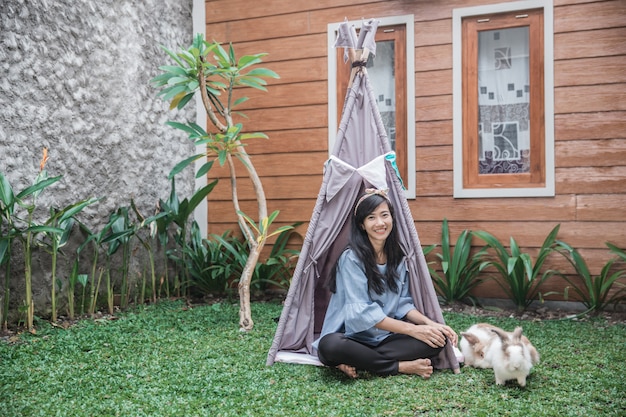 A woman in a tent on