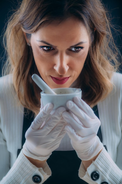 Woman Testing Scent of a Homemade Cosmetic Cream