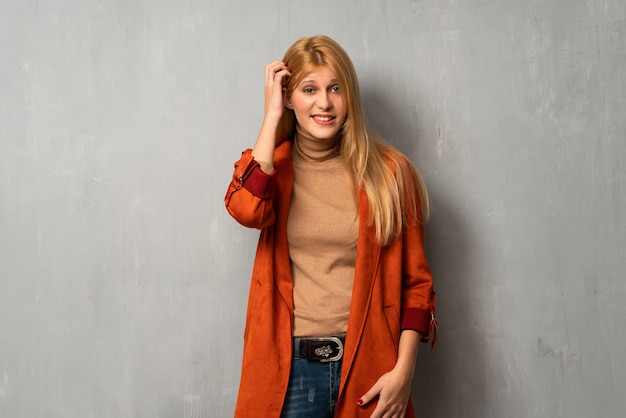 Woman over textured background having doubts