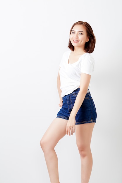 Woman thai in t-shirt and jeans wall 