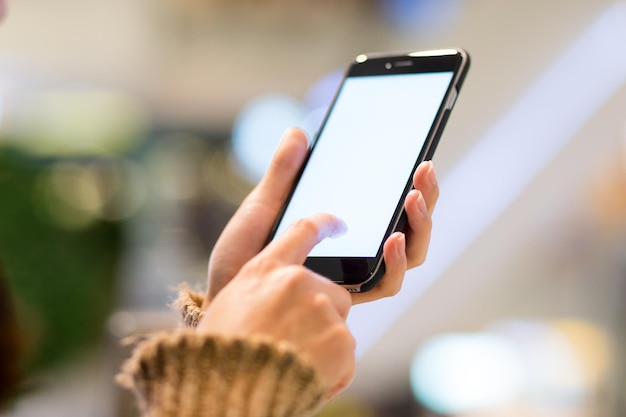 Woman touch on screen of cellphone