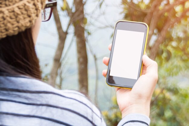 woman touch screen on smart phone 