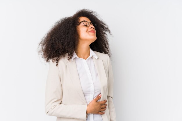 Woman touches tummy in studio