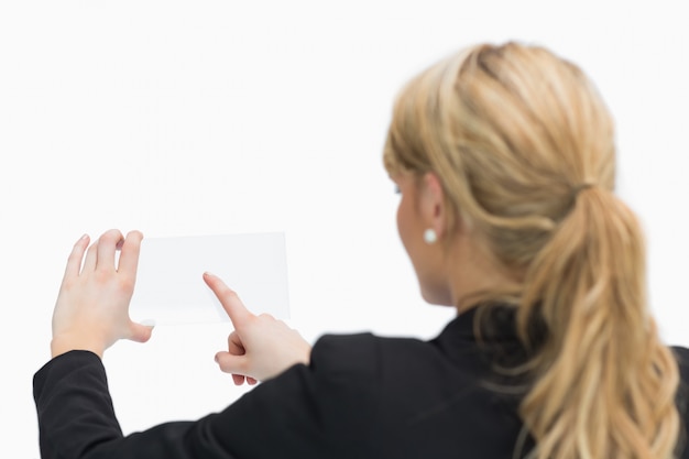 Woman touching pane