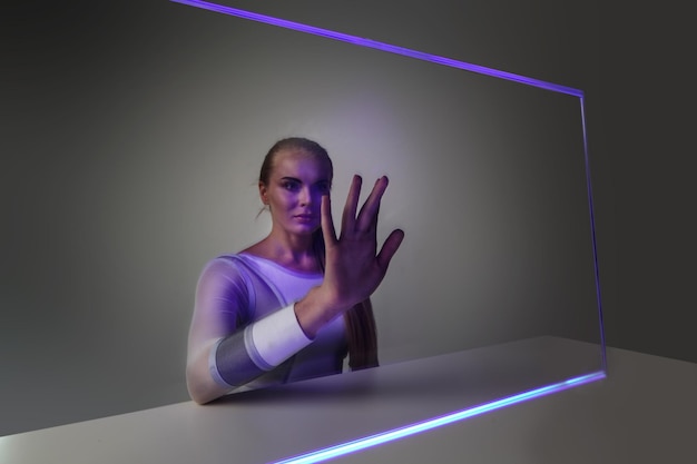 Woman touching virtual display