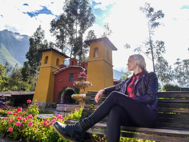 Woman tourist in a village in the Sacred Valley of the Incas in the city of Cusco