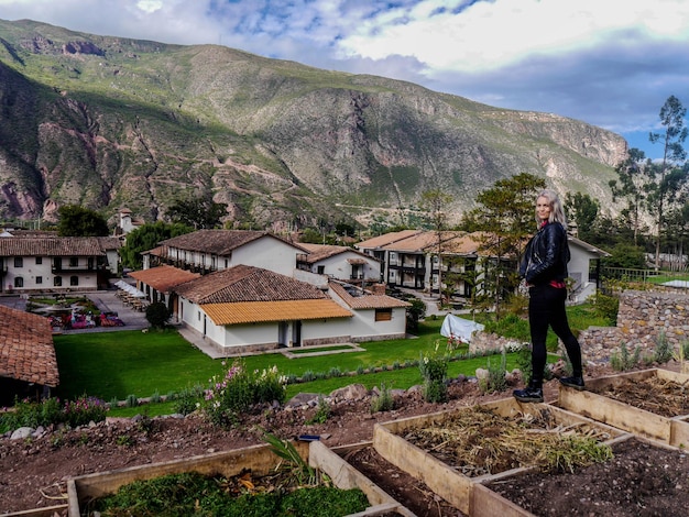 Woman tourist in a village in the Sacred Valley of the Incas in the city of Cusco