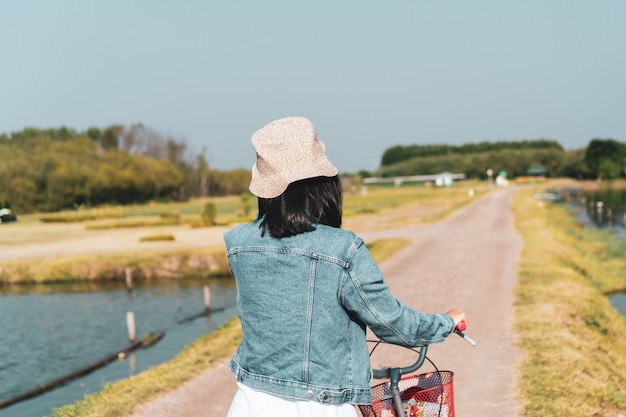 Woman travel around the world with backpack freedom concept.