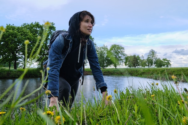 Woman travels alone in the wild