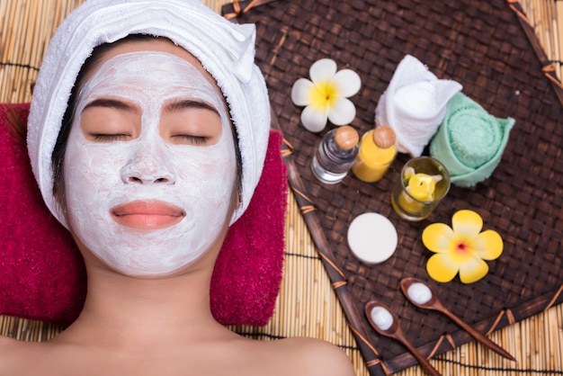 woman in treatment spa facial mask, day-spa