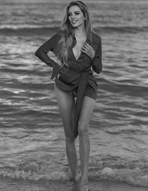 Woman on tropical ocean backgrounds enjoying the beautiful sea beautiful female model on the summer