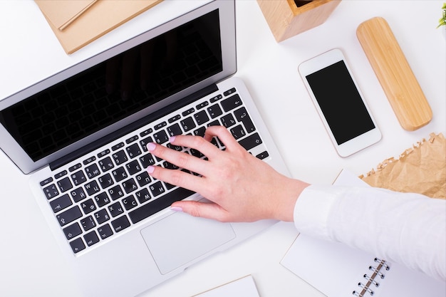 Woman typing on keyboard closeup