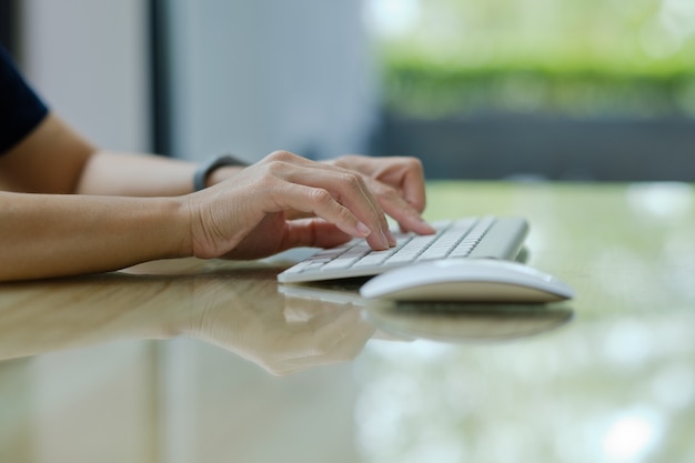 woman typing keyboard