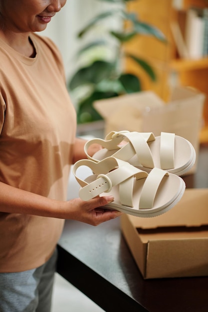 Woman Unpacking New Sandals