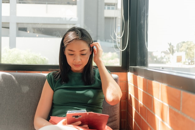 Woman use her smartphone phone 