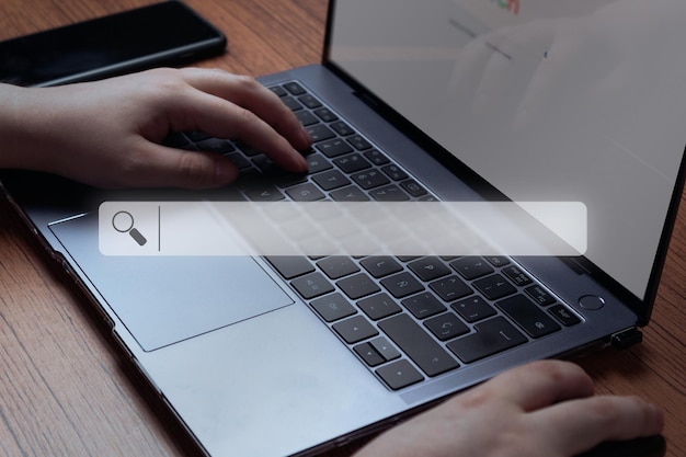 Photo woman use laptop for searching online virtual holographic search bar with copy space